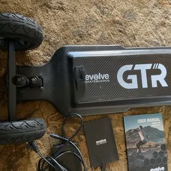Evolve Gtr electric skateboard carbon fiber like new