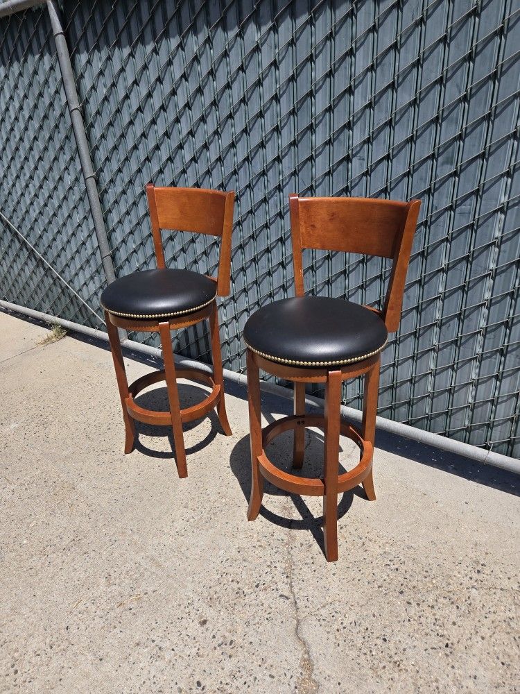 Two Swivel Bar Stools 30"