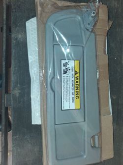 Brand new in box. HIMIKI aftermarket replacement sun visor (Part # 2280E). Direct replacement for a broken, sagging, or cracked driver-side visor.  
​