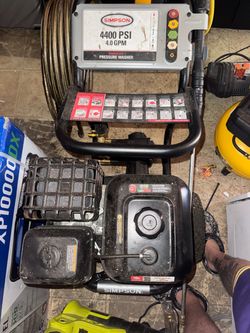 Pressure washer with extension and surface cleaning attachments