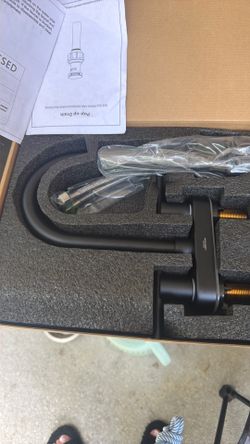 Brand new bathroom faucet..black. Modern