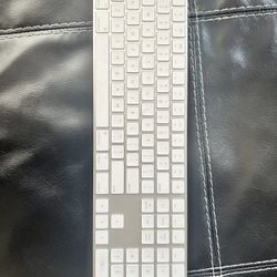 A Magic Keyboard With Numeric Keypad And Magic Mouse 