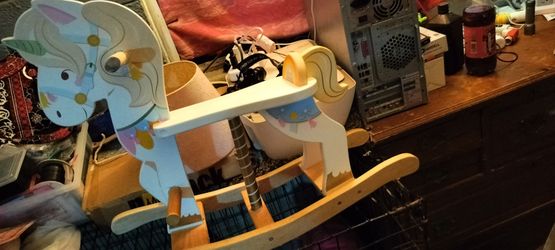 Wood rocking pony