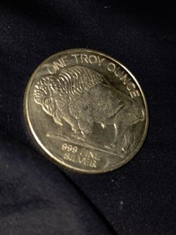 Troy Ounce .999 Fine Silver Bullion Round.