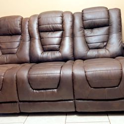 BEAUTIFUL  ALL ELECTRIC RECLINING COUCH W/TAG