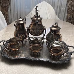 Vintage Sheridan Sterling silver on brass 7 piece coffee and tea set and tray. Heavy and so beautiful.