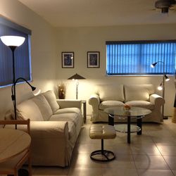 Loveseat, Sofa,round Glass Top Table. In Great condition