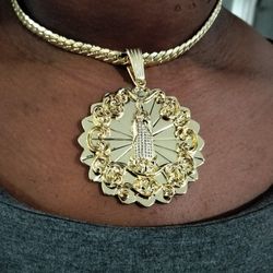 14k gold filled Cuban link chain and pendant 