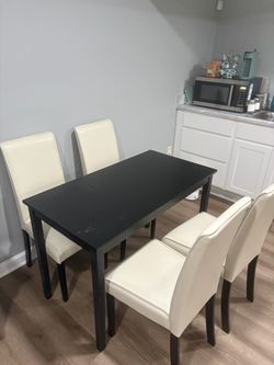 Ashley Furniture Black Dining Table with 4 Chairs