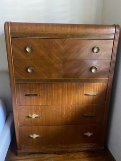Waterfall style dresser