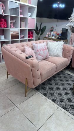 2 pink couches