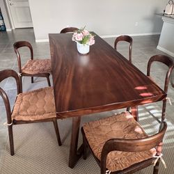 wood dining tables and six chairs