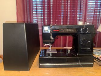 Black Janome sewing machine