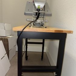 Hotronix Auto Open Clam 16x20 with two other platens and adjustable workbench