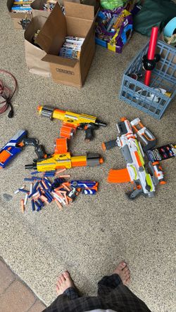 Assorted Nerf Guns and Bullets