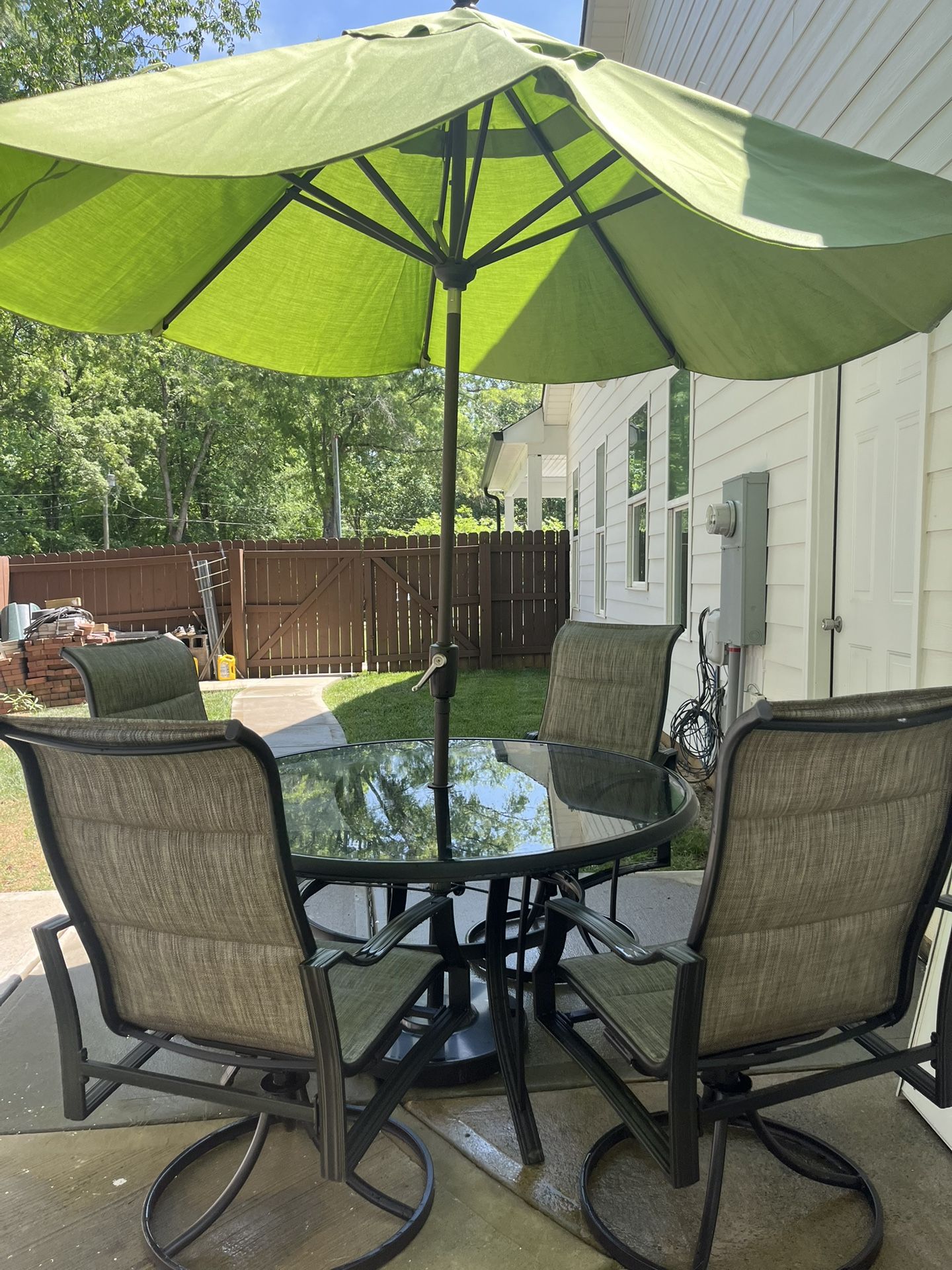 Hampton Bay Outdoor Patio Table, Chairs and Umbrella.