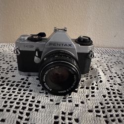 Pentax MG 35mm film camera with 50mm kit lens