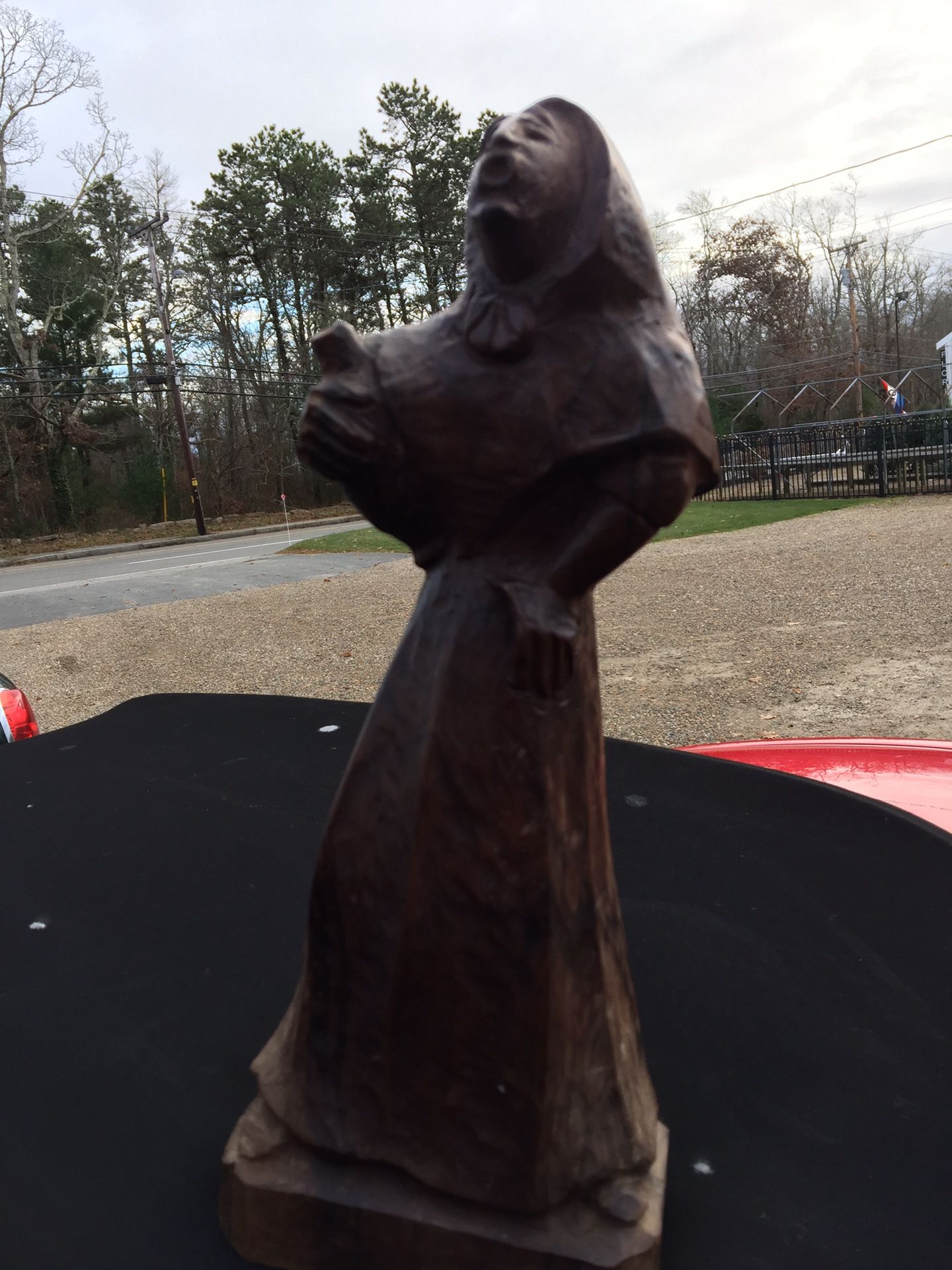 Antique Hand-Carved Dense Wooden sculpture of Singing Lady with Jug