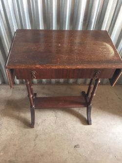 Antique table with two drop leafs