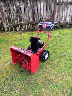 Troy-Bilt snow blower with electric start and pull start with 24" width and 5.1/2 hp motor  has 2 reverse and 6 forward runs great used very little