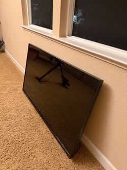 Flat Screen TV with Stand
