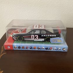 Atlanta Falcons race car and transporter vehicles