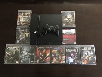 PS3 with cord and games