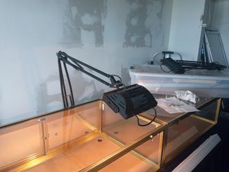 Clamp On Halogen Desk Display Lamp With Outlet On Frame