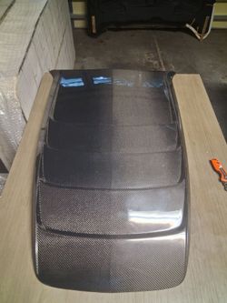 Carbon fiber hood plus front bumper