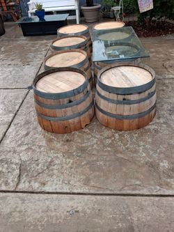 8- half wine barrels and heavy Duty glass tops! $40 each**Must GO!