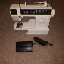 Vintage Singer Sewing Machine Powers On And Works, but needs fine tuned adjusted