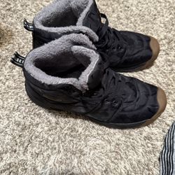 Black snow lined sneakers