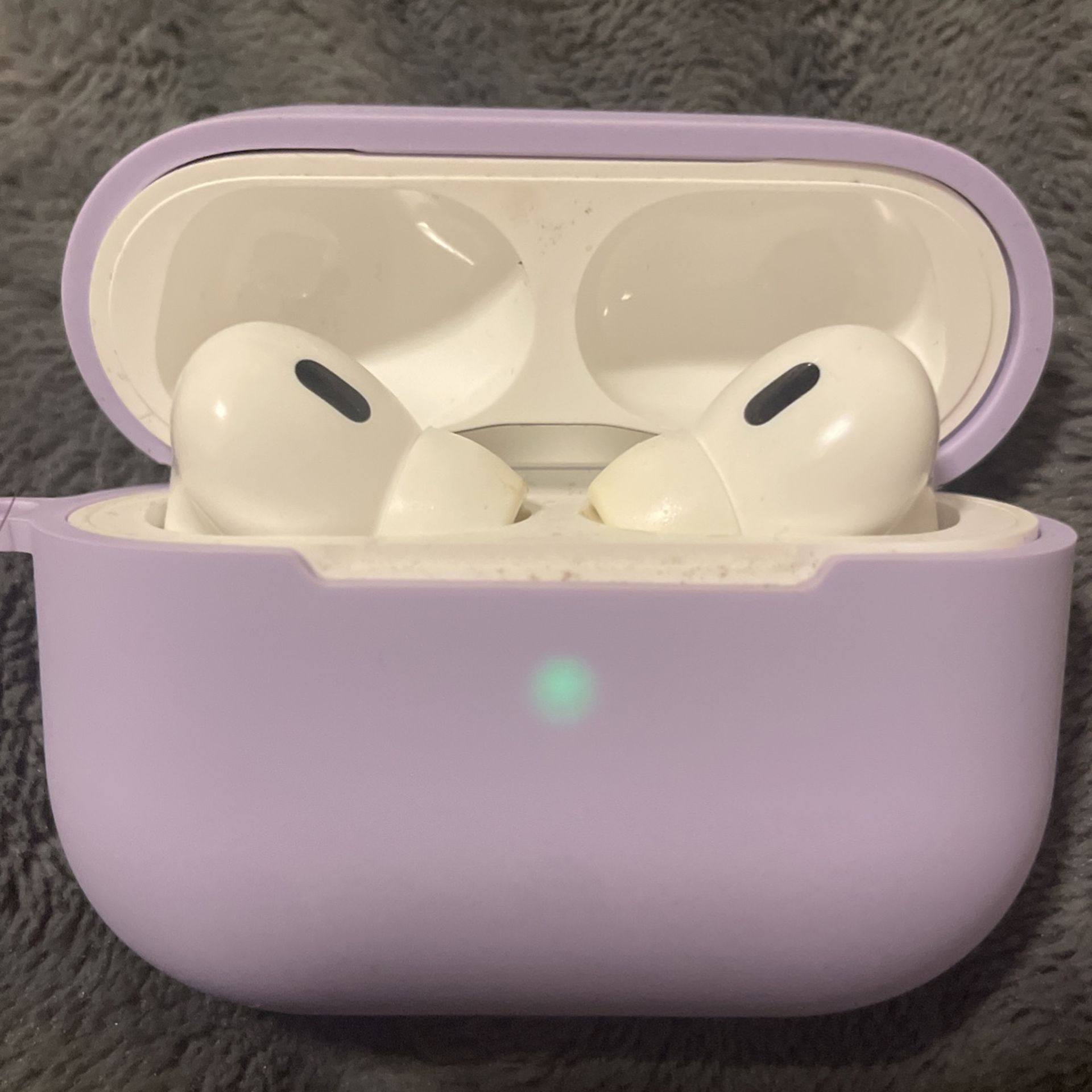 Air Pods with Lavender Case.