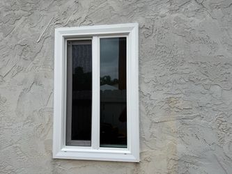 White Vinyl Sliding Window with Screen