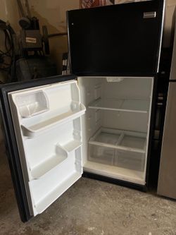Frigidaire black top and bottom refrigerator