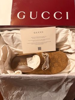 Women Gucci suede mules