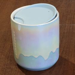 STARBUCKS 2023 Holiday Iridescent Rainbow Glacier Drip Ceramic Mug Cup 
8oz New with tags. It is 4 1/8" tall, weight 16zo plus shipping materials.
BOX