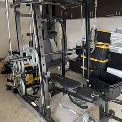 Weight bench exerciser (aka Smith machine) - Weider Pro 8500 (bench press, squat rack, lat pulldown, pectoral fly machine, cable crossovers, etc.)