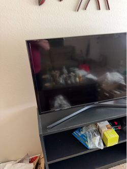 35in Samsung TV with a Amazon - Alexa Voice Remote Pro for Fire TV