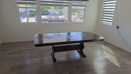 Solid dark wood table and chairs
