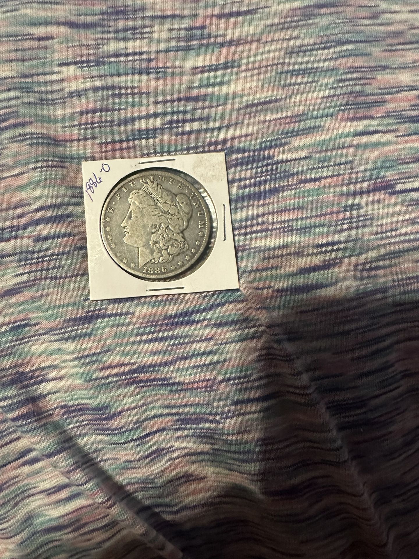 1886-O Morgan silver dollar
