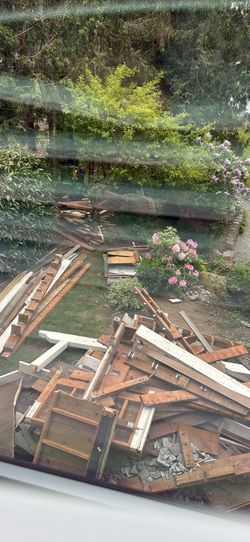 Free pressure treated 2x6 and assorted lumber. / wood product from deck demo