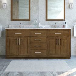 OVE Decors Athea bathroom vanity in an almond latte finish, featuring a white engineered stone top and brushed nickel hardware