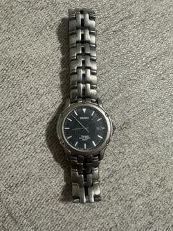Vintage Seiko Titanium Quartz Men’s Watch Black Dial Date 36mm 5 Bar 7N32-0069