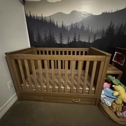 Wooden Crib With Pullout Storage
