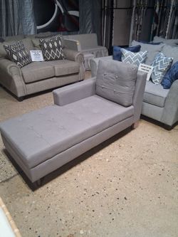 Gray mid-century modern style chaise with storage
