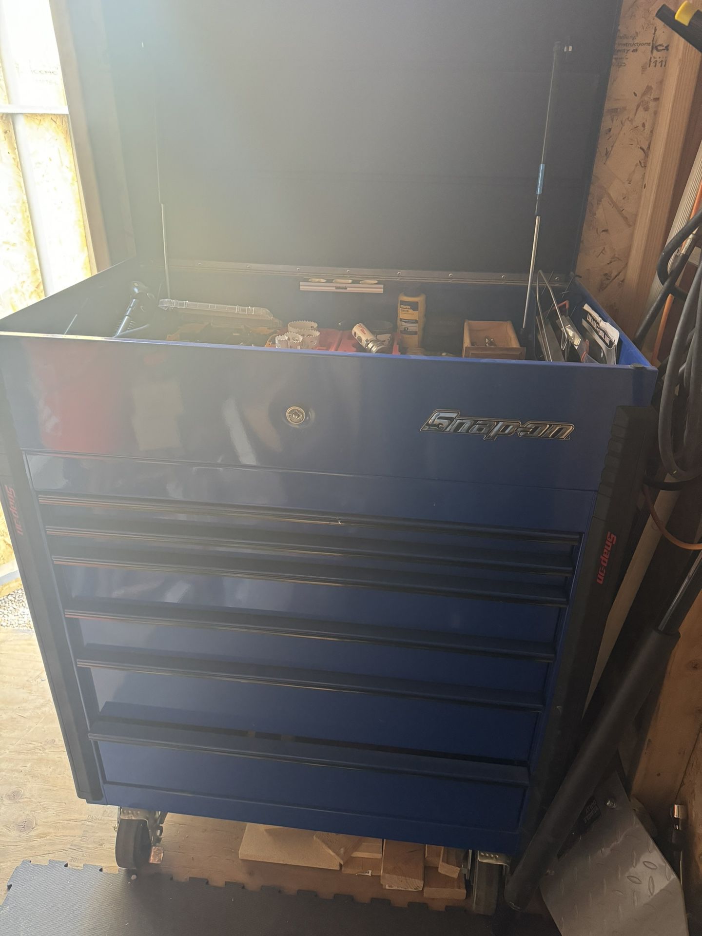 Blue Snap On Tool Box With Some Tools 