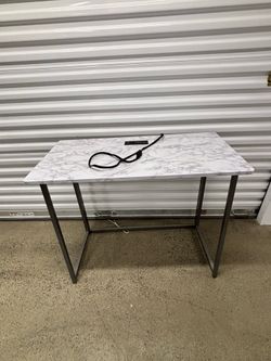 Table with charging plug