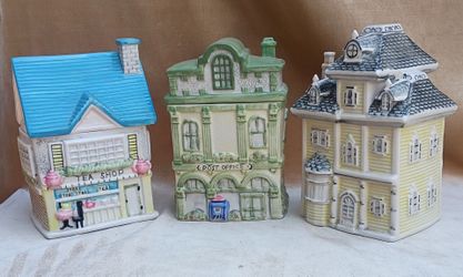 Ceramic town cookie jars sold together