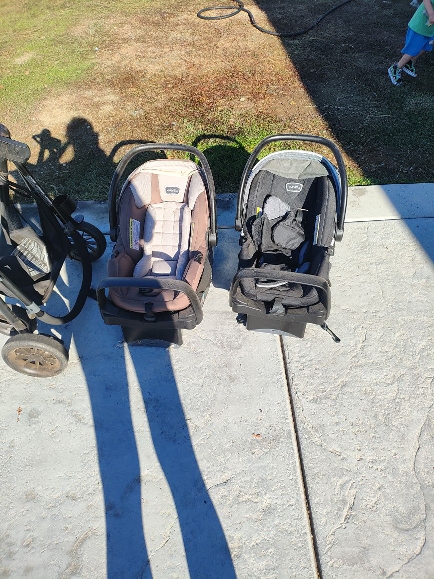 2 Car seats + Bases + Bassinet attachment + Stroller